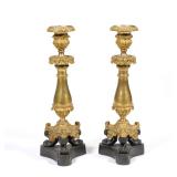 PAIR FRENCH EMPIRE GILT AND PATINATED BRONZE CANDLESTICKS