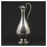 AN ENGLISH STERLING LIDDED EWER