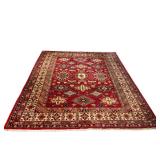 AN AFGHAN KAZAK WOOL RUG