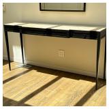 JOHN BOONE WELDED METAL CONSOLE TABLE WITH STONE TOP | A John Boone console table featuring a black 