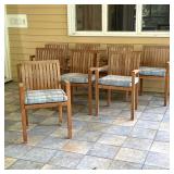 (8pc) SET OF HENRY HALL DESIGNS TEAK ARMCHAIRS | A set of eight outdoor armchairs constructed from t