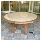 GIATI TEAK AND STONE INSET CIRCULAR DINING TABLE | This circular table features a solid teak perimet