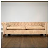 HENRY CHAN UPHOLSTERY TUFTED ROLLED ARM SOFA | This sofa features a button-tufted back and inner arm
