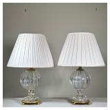 (2pc) PAIR OF RIBBED CRYSTAL SPHERE TABLE LAMPS WITH GILT METAL BASES | This pair of table lamps fea