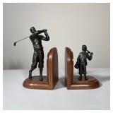 PAIR OF PATINATED GOLF THEMED BOOKENDS FEATURING GOLFER AND CADDY | This pair of bookends features t