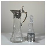 (2pc) ART NOUVEAU SILVER PLATED MOUNTED GLASS CLARET JUG AND MATCH PEWTER CRUET | The claret jug fea