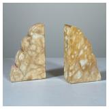 ITALIAN ART DECO STYLE CARVED ALABASTER BOOKENDS | A pair of carved stone bookends featuring a three