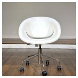 GORDON INTERNATIONAL CREAM SWIVEL DESK CHAIR | Cream upholstered swivel desk chair featuring a curve