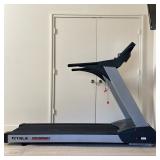 TRUE PERFORMANCE SERIES MOTORIZED TREADMILL | Motorized treadmill featuring a grey and black frame w