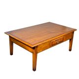 CHERRY FINISH WOOD COFFEE TABLE WITH DRAWER