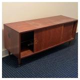 MID-CENTURY MODERN STAINED WOOD CABINET WITH SLIDING DOORS