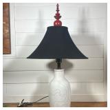 CONTEMPORARY CERAMIC TABLE LAMP WITH INCISED DESIGN AND RED FINIAL