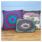 (3pc) THREE ASSORTED DECORATIVE PILLOWS INCLUDING NEEDLEPOINT AND SUZANI STYLE EMBROIDERY