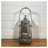 INDIAN REPOUSSÉ METAL TILTING PITCHER ON STAND