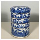 JAPANESE BLUE AND WHITE PORCELAIN FOUR-TIER STACKING BOX
