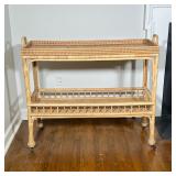 OUTLOOK INTERNATIONAL RATTAN AND BAMBOO TWO-TIER ROLLING CONSOLE TABLE