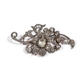 LOT 112 | ANTIQUE ROSE CUT DIAMOND PIN EN TREMBLANT  | Marked "K18" having a central rough-cut diamo