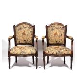  LOT 147 | PAIR LOUIS XVI-STYLE CARVED OAK FAUTEUILS | Late 19th century, with tapestry upholstery d