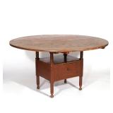 LOT 161 | 18TH C. NEW ENGLAND ROUND RED PAINTED HUTCH TABLE | Having a pine two board scrubbed top, 