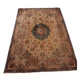 LOT 169 | FIRST QUARTER 20TH CENTURY SCULPTED TABRIZ CARPET | Overall beige ground with a central me