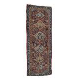 LOT 173 | NORTHWEST PERSIAN RUNNER | Early 20th century, with a row of six serrated diamond-shaped g