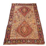 LOT 178 | SOUMAC RUG | 20th century, having two medallions on a beige field densely populated with f