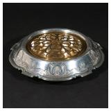 LOT 189 | TIFFANY & CO. STERLING SILVER FLOWER BOWL | In three pieces, with a silver plated liner an