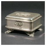 LOT 197 | RUSSIAN (WARSAW) SILVER FOOTED ETROG SUGAR BOX | The top decorated with flowers, two protr