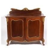 LOT 238 | LOUIS XV CARVED CABINET | With shaped top crested by backboard, over double cabinet doors 