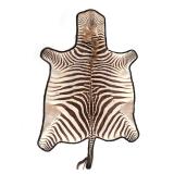LOT 320 | NATURAL ZEBRA SKIN HIDE RUG | h. 92 w. 62 in.