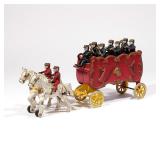 LOT 357 | OVERLAND CIRCUS BAND WAGON IRON TOY | Circa 1910, painted cast iron Kenton pull toy