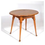 LOT 381 | 18TH CENTURY MAPLE & TIGER MAPLE OVAL TAVERN TABLE | Having splayed round tapering legs en
