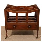 LOT 394 | EARLY 19TH CENTURY REGENCY MAHOGANY CANTERBURY | Having four slots centered by hand hold o