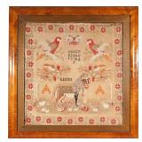 LOT 397 | ANTIQUE NEEDLEPOINT SAMPLER | Mid-19th century Victorian English sampler showing two parro