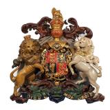 LOT 442 | ROYAL COAT OF ARMS OF THE UNITED KINGDOM | Composition relief plaque with polychrome and g
