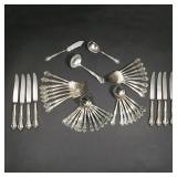 LOT 455 | (49PC) EASTERLING STERLING FLATWARE SERVICE | Eight piece place setting, comprising: 8 din