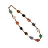 LOT 476 | SCARAB SPECIMEN GOLD NECKLACE | Having thirteen carved scarabs of tigers eye, jet, banded 