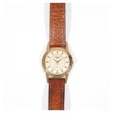 LOT 485 | LONGINES 14K GOLD AUTOMATIC WRISTWATCH | 14k gold case with faceted bezel, baton numerals,
