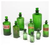 LOT 516 | (9PC) 19TH CENTURY GREEN APOTHECARY JARS | Molded green glass including a set of 3 hexagon