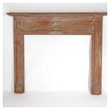 LOT 700 | 18TH CENTURY PRIMITIVE WOODEN FIRE PLACE SURROUND | In old red paint h. 52 w. 64 d. 7 in.