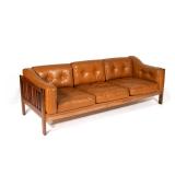 MID-CENTURY ROSEWOOD SPINDLE BACK SOFA | Loose leather cushions including side h. 27 w. 78 d. 33 in.