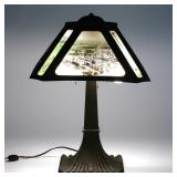 LOT 71 | ANTIQUE PHOTOGRAPHIC PANEL & BRONZE LAMP | Bronze shade with eight reverse photographic gla