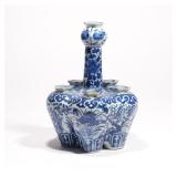 LOT 84 | QING DYNASTY BLUE & WHITE BULB POT | For six buds, each with a six-pointed rim, with blue u