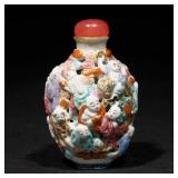 LOT 89 | CHINESE FAMILLE ROSE RETICULATED SNUFF BOTTLE | 19th century, with Eighteen Luohan decorati