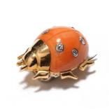 Or "ladybird clip brooch," having a shield of cut coral mounting six full cut diamonds bezel set in 