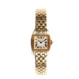 LOT 112 | CARTIER 18K GOLD LADY