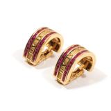 Italian 18k yellow gold, designed as two rows of square cut rubies centering Roman numerals VIII - X