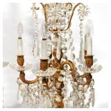 19th century, having notched spire finials, over two tiered corona, over 5-lite candle holders, susp