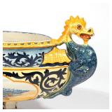 French faience pottery pedestal jardiniere having dragon-form handles with "decor riche" scrollwork 