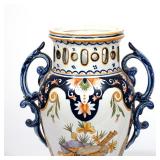French faience pottery vases having deep blue glazed scrollwork handles and reticulated rims, one de